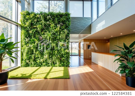 A modern space with wooden floors and green walls 122584381