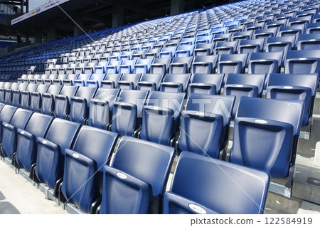 Seats lined up in the stadium Seats lined up in the stadium 122584919