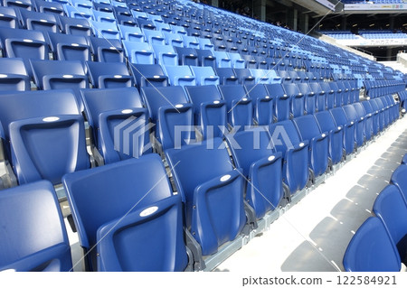 Seats lined up in the stadium 122584921