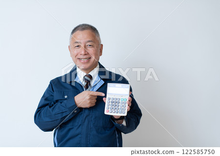 A man in work clothes, a veteran A man in work clothes, a veteran 122585750