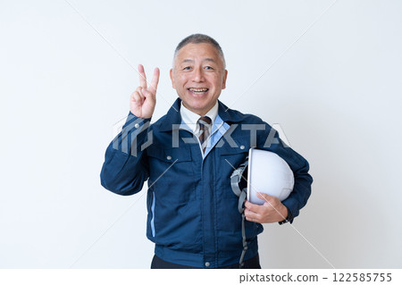 A man in work clothes, a veteran A man in work clothes, a veteran 122585755