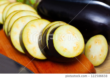 Sliced fresh aubergines Sliced fresh aubergines 122586638