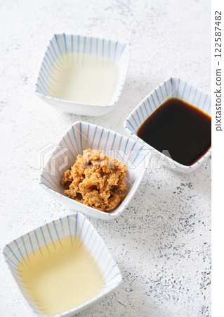 Fermented seasonings: miso, mirin, soy sauce, vinegar Fermented seasonings: miso, mirin, soy sauce, vinegar 122587482