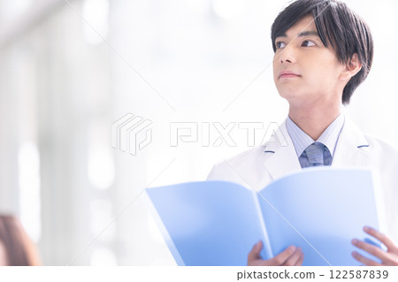 Image of business in white coat 122587839