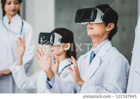 Image of business in white coat Image of business in white coat 122587845