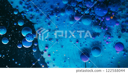 Art flow. Bubble ink. Mystical pouring blue emulsion floating gel acrylic purple drops. Wave mix particles colorful abstract background. 122588044