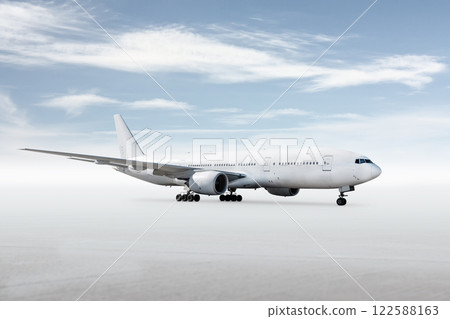 White wide body passenger jetliner isolated on bright background with sky White wide body passenger jetliner isolated on bright background with sky 122588163