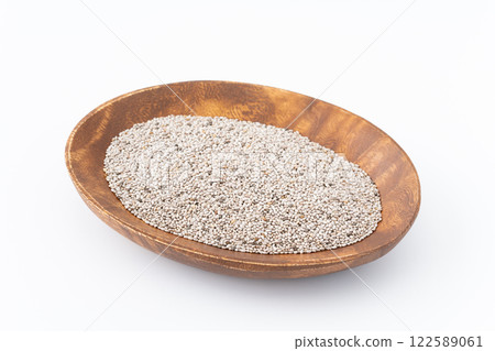 White chia seeds in a wooden plate White chia seeds in a wooden plate 122589061