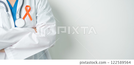 Doctor with Orange Ribbon for Leukemia, Kidney cancer day, world Multiple Sclerosis, CRPS, Self Injury Awareness month. Healthcare and word cancer day concept Doctor with Orange Ribbon for Leukemia, Kidney cancer day, world Multiple Sclerosis, CRPS, Self Injury Awareness month. Healthcare and word cancer day concept 122589564