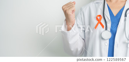 Doctor with Orange Ribbon for Leukemia, Kidney cancer day, world Multiple Sclerosis, CRPS, Self Injury Awareness month. Healthcare and word cancer day concept Doctor with Orange Ribbon for Leukemia, Kidney cancer day, world Multiple Sclerosis, CRPS, Self Injury Awareness month. Healthcare and word cancer day concept 122589567