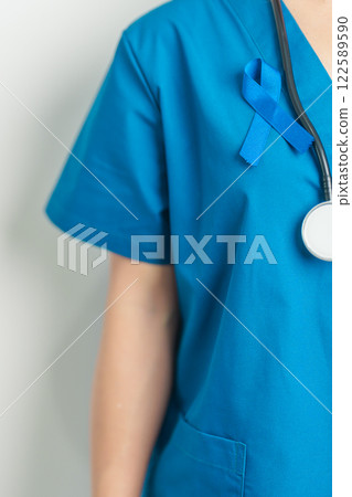 March Colorectal Cancer Awareness month, doctor with dark Blue Ribbon for supporting people living and illness. Healthcare, hope and World cancer day concept March Colorectal Cancer Awareness month, doctor with dark Blue Ribbon for supporting people living and illness. Healthcare, hope and World cancer day concept 122589590
