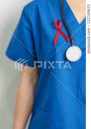 Doctor with Burgundy Red Ribbon for March multiple myeloma Cancer and December World Aids Day Awareness month. Healthcare and world cancer day concept Doctor with Burgundy Red Ribbon for March multiple myeloma Cancer and December World Aids Day Awareness month. Healthcare and world cancer day concept 122589625