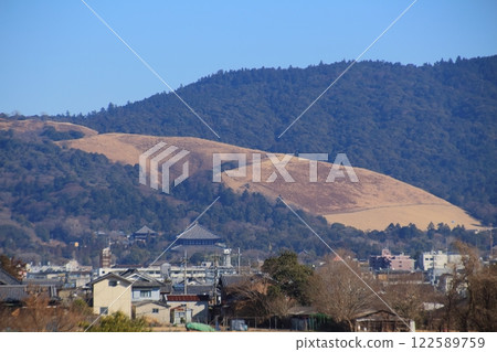 Mount Wakakusa, where mountain burning takes place, seen from the World Heritage Site of Nara Heijo Palace Mount Wakakusa, where mountain burning takes place, seen from the World Heritage Site of Nara Heijo Palace 122589759