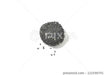Black sesame balls photographed on a white background Black sesame balls photographed on a white background 122590741