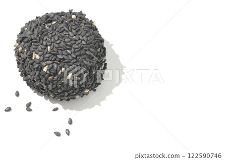 Black sesame balls photographed on a white background 122590746
