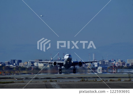 Boeing 777 taking off from Fukuoka Airport Boeing 777 taking off from Fukuoka Airport 122593691