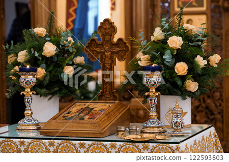 Serene Orthodox Altar Arrangement with Floral Accents and Icon 122593803