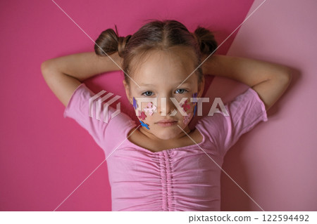 A sad, resentful, lonely girl with an autism spectrum disorder. Social inequality in society towards children with the syndrome A sad, resentful, lonely girl with an autism spectrum disorder. Social inequality in society towards children with the syndrome 122594492