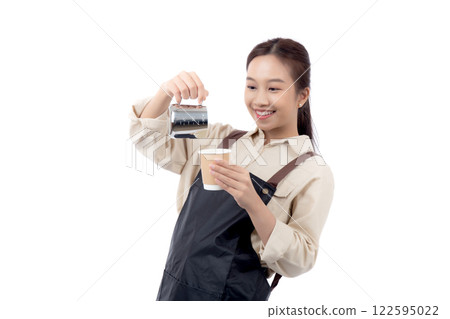 Portrait young asian woman barista work happy holding milk jug pour in coffee cup isolated. Portrait young asian woman barista work happy holding milk jug pour in coffee cup isolated. 122595022