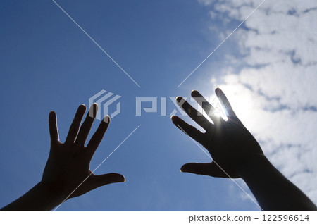 Hand over the blue sky 122596614