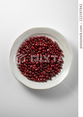 Red beans on a white plate 122597842