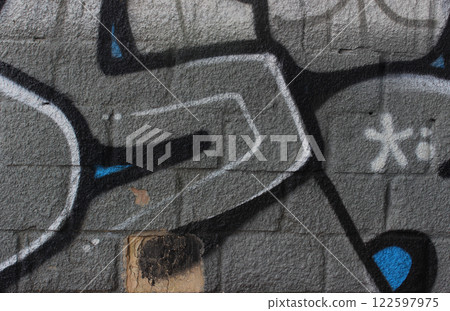 Rough Bricks Wall Is Covered With Street Graffiti  122597975
