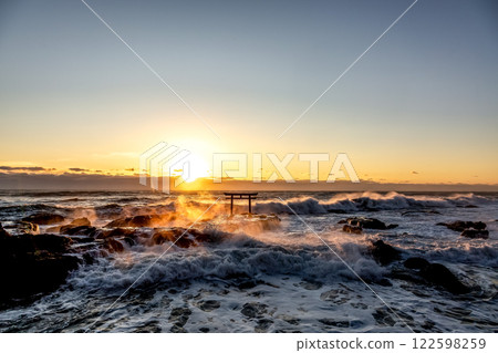 A sunrise scene at Kamiiso with raging waves and rocks burning like flames A sunrise scene at Kamiiso with raging waves and rocks burning like flames 122598259
