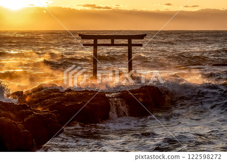 A sunrise scene at Kamiiso with raging waves and rocks burning like flames A sunrise scene at Kamiiso with raging waves and rocks burning like flames 122598272