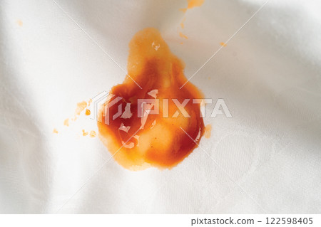 Dirty tomato sauce stain removal or ketchup on cloth accident to wash with washing powder, cleaning housework. 122598405