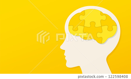 Illustration of a brain made of yellow puzzle pieces and a profile on a yellow background 122598408