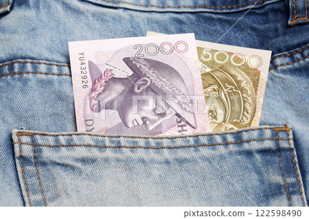 Albanian Lek in the pocket of blue jeans Albanian Lek in the pocket of blue jeans 122598490