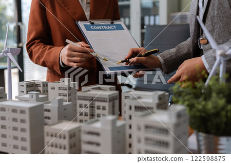 Home Insurance and Real estate investment concept, new client after signing agreement contract with approved property application form. 122598875
