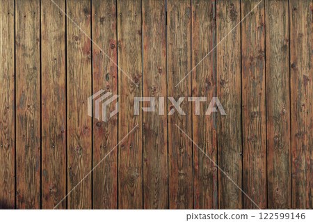 Wooden background. Surface of old rustic wooden fence with peeling paint and scratches 122599146