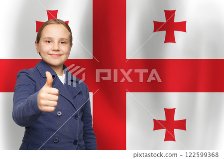 Happy child with thumb up on Georgian flag background. Education and childhood in Georgia concept 122599368