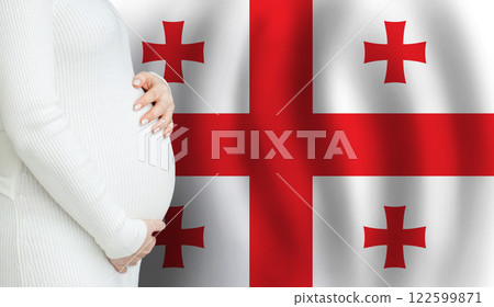 Pregnant woman belly against Georgian flag background. Demographics and pregnancy in Georgia concept Pregnant woman belly against Georgian flag background. Demographics and pregnancy in Georgia concept 122599871