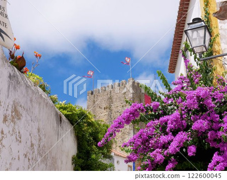 Obidos Castle tower and beautiful bougainvillea, Obidos, Portugal Obidos Castle tower and beautiful bougainvillea, Obidos, Portugal 122600045