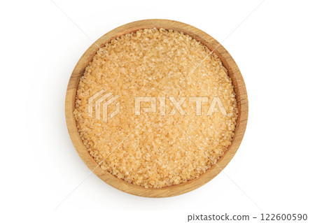 The brown sugar in wooden bowl isolated on white background. Top view. Flat lay The brown sugar in wooden bowl isolated on white background. Top view. Flat lay 122600590