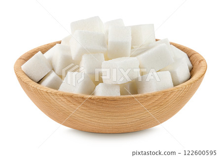 Sugar cubes in a wooden bowl isolated on white background Sugar cubes in a wooden bowl isolated on white background 122600595