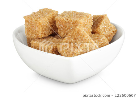 brown sugar in a ceramic bowl isolated on white background 122600607