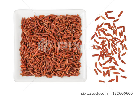 red rice in a ceramic bowl isolated on white background. Top view. Flat lay red rice in a ceramic bowl isolated on white background. Top view. Flat lay 122600609