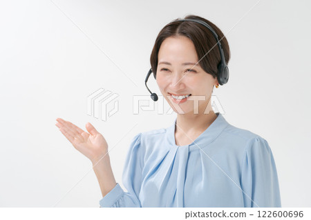 A woman with a headset A woman with a headset 122600696