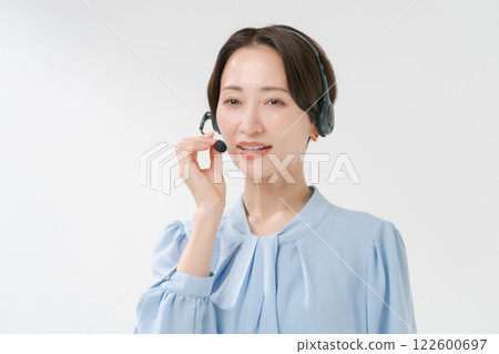 A woman with a headset 122600697