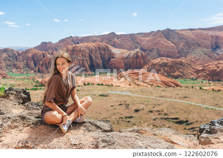 Young girl on trail at Fire Valley in Utah 122602076