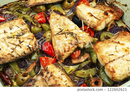 Fish fillet and baked vegetables. 122602621