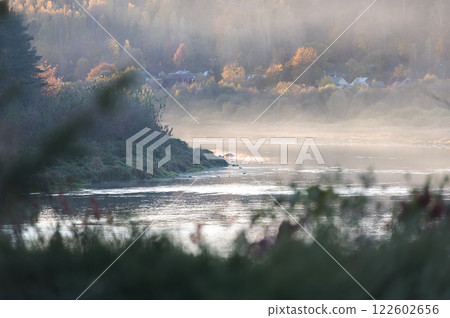 Golden sunset mist over Daugava river near Kraslava, Latvia Golden sunset mist over Daugava river near Kraslava, Latvia 122602656