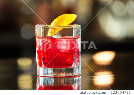 Closeup glass of red cherry juice at bar counter background. Closeup glass of red cherry juice at bar counter background. 122604781