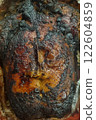 Rustic Cooked Meat with Charred Texture for Culinary and Food Presentation 122604859