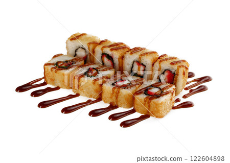 Closeup image of deep fried tempura rolls served with teriyaki sauce isolated at white background. Closeup image of deep fried tempura rolls served with teriyaki sauce isolated at white background. 122604898