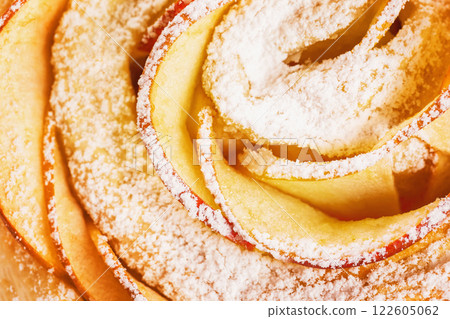 Closeup image of fresh twisted bakery with sweet sugar powder. 122605062