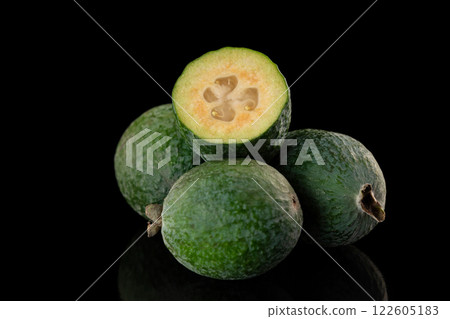Closeup feijoa group of fruits isolated at black background. Closeup feijoa group of fruits isolated at black background. 122605183